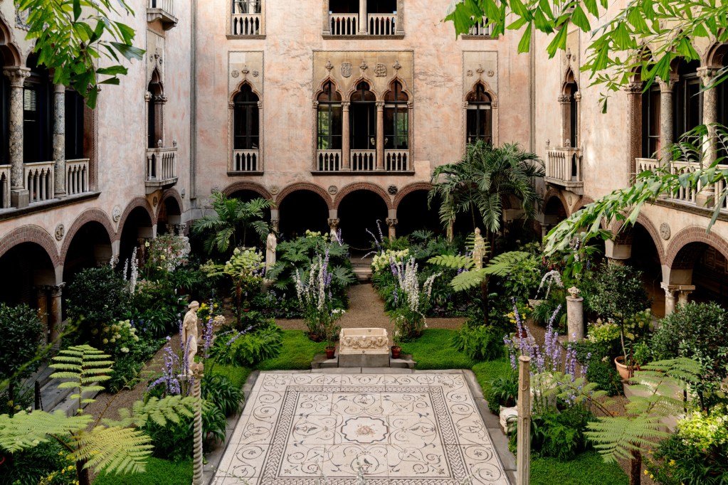 Isabella Stewart Gardner's museum courtyard with lush greenery in Boston