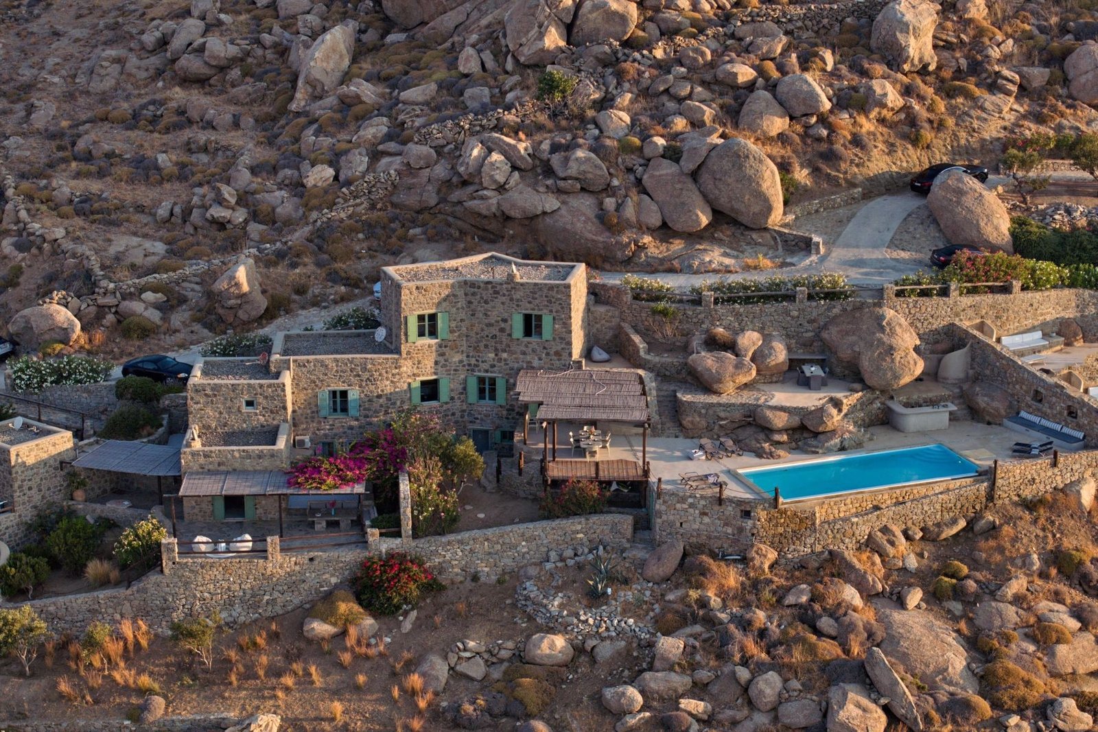 stone villa in Mykonos, Greece aerial view with pool